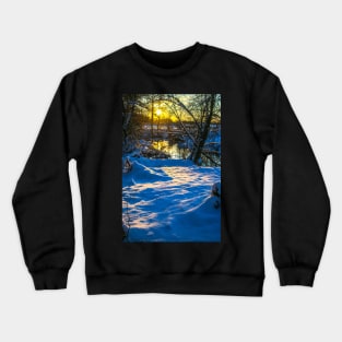 Snow falling on a river with snowy banks Crewneck Sweatshirt